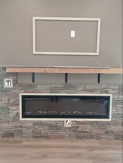 Electric fireplace TV receptacle